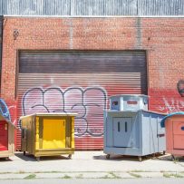 Oakland artist repurposes trash into vibrant houses for the homeless