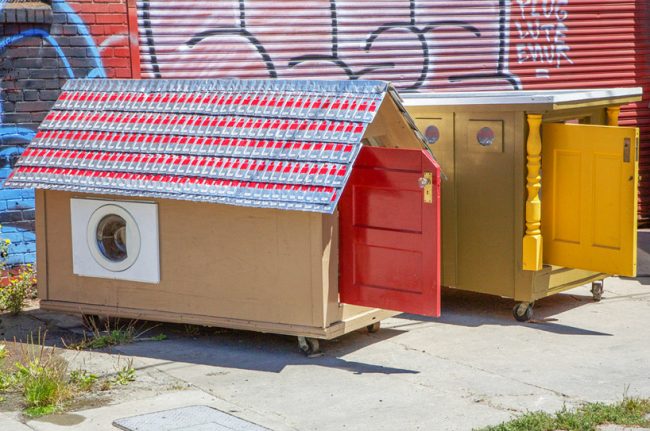 a washing machine door is repurposed into a window for the house