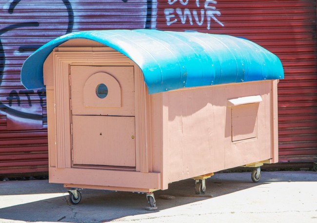 discarded plastic sheeting is reused as a rain-proof roof