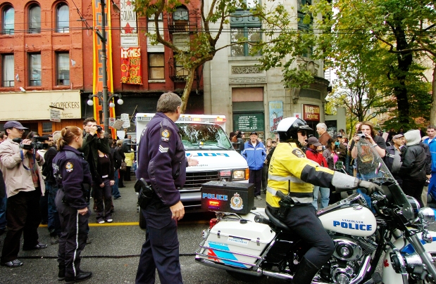 Police move in and remove anti-poverty protesters squatting in the North Star Hotel in 2006. Photograph by: Ian Smith , Vancouver Sun