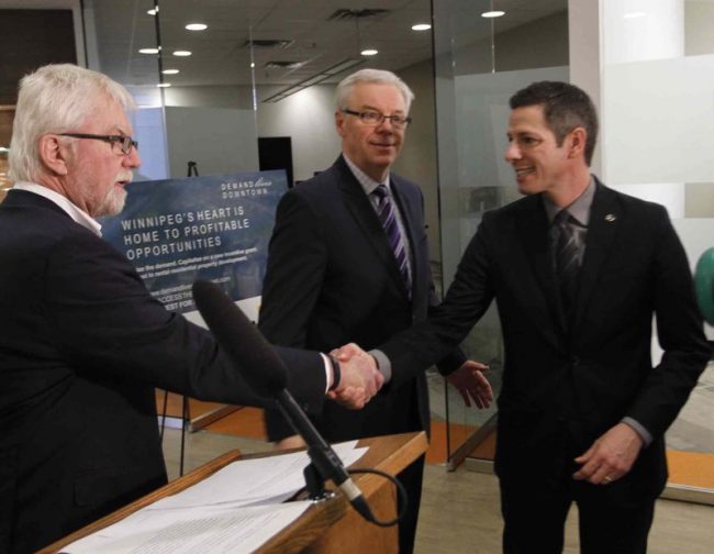 From left, Ross McGowan, president and CEO CentreVenture Development Corporation, Premier Greg Selinger and Mayor Brian Bowman at the announcement that applications are being taken for the new incentive program.