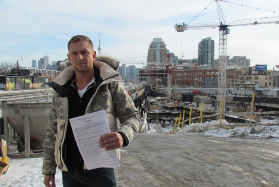 John Wilk, 32, put $40,000 down on a one-bedroom plus den unit back in November of 2011. SUSAN PIGG/TORONTO STAR