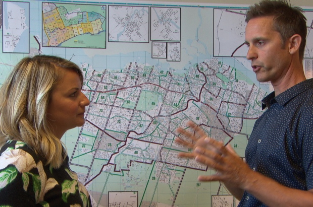Charlie Sezlik, right, and staff often market Ottawa homes to foreign buyers. (CBC)