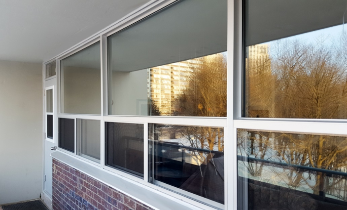 Phasing in Energy Efficiency: Why Your Multifamily Building Needs Fixed Over Slider Windows